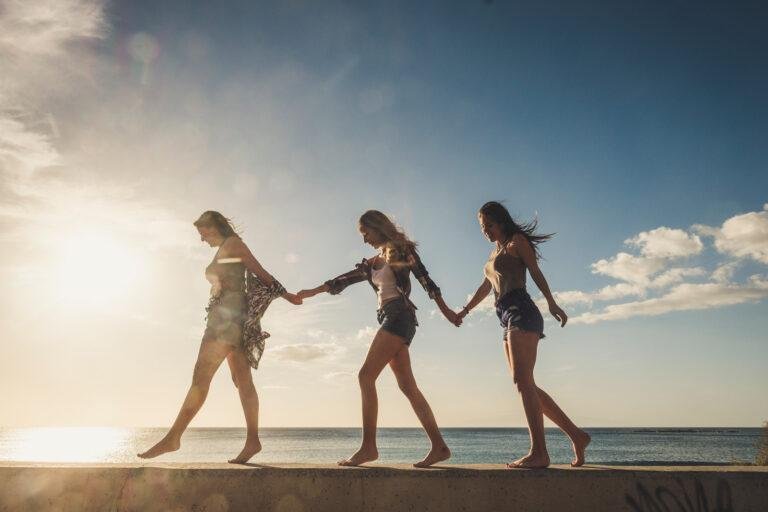 Women friends walk together in group