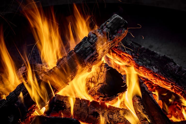 Close-up of a vibrant campfire at night